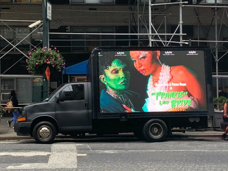 NYX Halloween-themed mobile billboard advertising on a city street, showcasing 'Frankie & Her Bride showing in NYC.