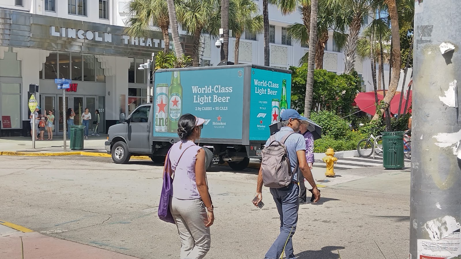 Digital Billboard Truck for Heineken beer advertisement parked by the sidewalk in front of Lincoln Theatre in sunny Miami, Florida.