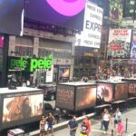 A fleet of LED Screen Truck Rental parked in Times Square, New York while promoting India's biggest cinematic universe.
